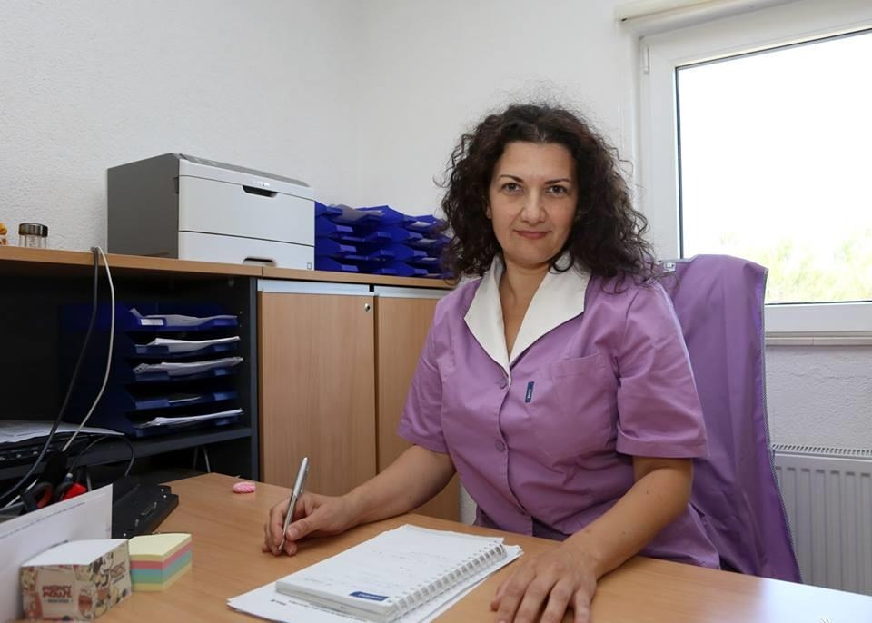 Portrait of a friendly Croatian female head caregiver in a family-run senior care home in Rogoznica