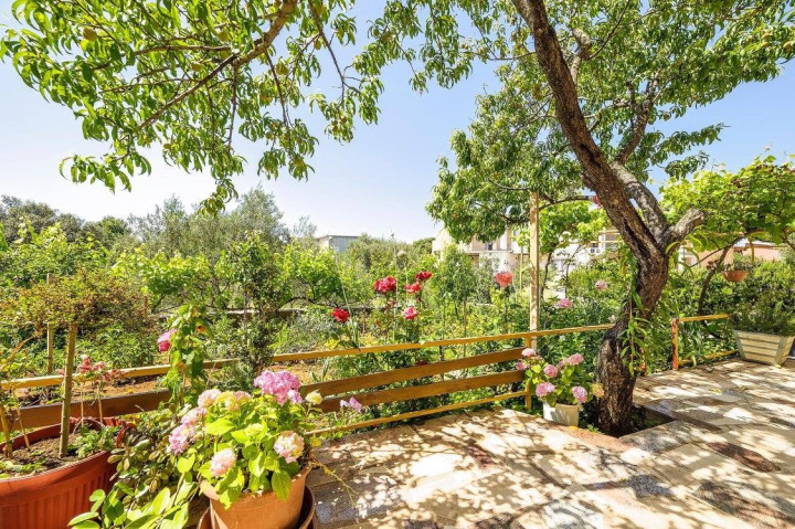Sea-view terrace at a senior care home in Rogoznica, sunset light